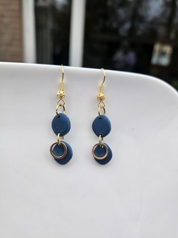 Oorbellen blauw goud hangers